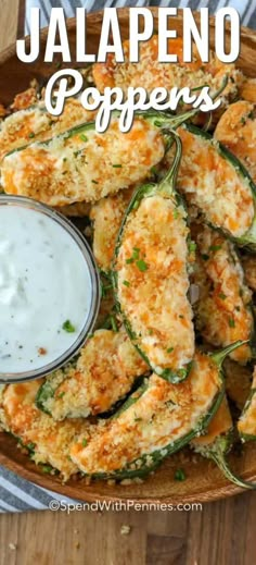 jalapeno poppers on a plate with ranch dressing