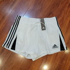 Nwt Adidas Shorts. They Have 2 Front Pockets. Material Had The Parachute/Swishy Feel. Adidas Sporty White Athletic Shorts, White Adidas Sports Shorts, Adidas White Sports Shorts, Adidas White Athletic Shorts With Built-in Shorts, Adidas White Sporty Shorts, Adidas White Bottoms With Built-in Shorts, Adidas White Shorts, Adidas White Summer Bottoms, Adidas White Casual Shorts