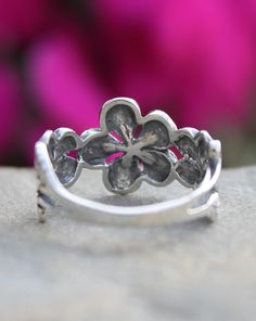 Sterling Silver Plumeria Flower Ring | The Life Divine Flower detail measures approximately 1/2" H Flower Shaped Metal Ring For Promise, Metal Flower Ring For Promise, Bohemian Flower Ring For Promise, Bohemian Flower Rings For Anniversary, Adjustable Nickel Free Flower Ring, Bohemian Adjustable Flower Ring For Anniversary, Adjustable Flower-shaped Promise Ring, Nature-inspired Open Flower Ring, Nickel-free Flower Shaped Ring