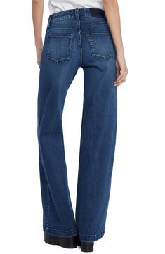 Effortlessly cool and casual-chic, these stretchy jeans flaunt a high waist and full-length wide legs that create a dramatic profile. 32" inseam; 23" leg opening; 10 1/4" front rise Zip fly with button closure Five-pocket style 71% cotton, 25% REPREVE® recycled polyester, 3% rayon, 1% spandex REPREVE recycled polyester is made from 100% post-consumer recycled plastic bottles Machine wash, tumble dry Imported Versatile Full Length Flare Jeans For Fall, Trendy Relaxed Fit Full Length Flare Jeans, Trendy Stretch Wide-leg Jeans, Versatile High Rise Dark Wash Flare Jeans, Versatile Mid-rise Flare Jeans In Medium Wash, Versatile High-rise Flare Jeans With Five Pockets, High Rise Versatile Flare Jeans, Medium Wash Relaxed Fit Full Length Flare Jeans, High Waist Relaxed Fit Denim Blue Flare Jeans