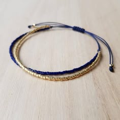 Cobalt Blue and Gold Minimalist Bracelet Dark Blue Tiny Bead | Etsy Luxury Beaded Jewelry, Adjustable Blue Friendship Bracelets With Gold Beads, Minimalist Blue Jewelry With Tiny Beads, Blue Jewelry With Gold Beads, Blue Bracelets With Tiny Beads For Friendship, Blue Beaded Bracelets With Tiny Beads For Everyday, Everyday Blue Bracelets With Gold Beads, Everyday Blue Beaded Bracelets With Tiny Beads, Blue Bracelets With Gold Beads For Jewelry Making