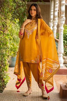 Mustard kurta with thread embroidered floral patterns embellished by cutdana. Comes with matching dhoti pant and dupatta. - Aza Fashions Kurta Patterns, Dhoti Pants, Tarun Tahiliani, Yellow Silk, Organza Dupatta, Modern Bride, Pant Set, Embroidered Silk, Floral Patterns