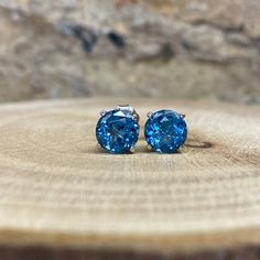 Sleek sellouts! 🤓. Order Round Cut London Blue Topaz Stud Earrings 14K White Gold Unisex Blue Topaz Earrings Round Blue Topaz Earrings Gold Stud Earrings #7284 at $256.00 #14kWhiteGold #GoldStudEarrings #BlueTopazEarrings #UnisexBlueTopaz #TopazStud #BlackFridaySale #EarringsRound #LondonBlue #RoundCut #EarringsUnisex Chanel Stud Earrings, Blue Sapphire Earrings, Sapphire Stud Earrings, Blue Sapphire Studs, Ruby Earrings Studs, Gold Amethyst Ring, Basket Style, Sapphire Earrings Studs, Sapphire Studs