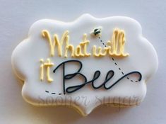 a cookie with the words what will it bee written on it