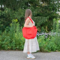 A travel bag optimized for flying: it fits under an airplane seat, on top of your roller bag, and on your shoulder. Exterior pockets keep your travel essentials within reach, including a tech pocket that fits up to a 16” laptop, and side pockets for your water bottle and boarding pass. The bag packs down into its interior detachable pouch for easy storage. If there's one thing we all agree on at Golden Rule, it's that Baggu is essential. Form and function meet in this eco carry-all that works ha Baggu Carry On, On-the-go Travel Backpack With Pockets, Functional Bags With Side Pockets For On-the-go, Everyday Nylon Bags With Side Pockets, Versatile Gym Bag With Pockets For On-the-go, Nylon Bags With Multiple Pockets For Trip, Nylon Weekender Bag With Pockets For Everyday Use, Casual Large Capacity Travel Accessories For Trips, Functional Bags With Multiple Pockets For Trips