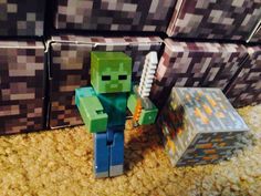 an image of a minecraft figure next to some boxes