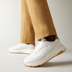 Characterized by smooth and dynamic forms, these men's Hogan Hyperlight sneakers combine the jogging shoe lines and urban features. The nappa leather upper recalls iconic details of the brand and is enhanced by a side H. An ultra dynamic style, with a memory foam insole and a lightweight outsole with spikes inspired by the historic H383 style. White Leather Running Shoes With Textured Sole, Modern Running Shoes With Textured Sole, Modern Leather Running Shoes With Cushioned Footbed, White Leather Running Shoes With Vibram Sole, Functional White Leather Walking Shoes, Dynamic Leather Sneakers With Vibram Sole, Modern White Sole Sneakers For Walking, Modern Running Shoes With Vibram Sole For Jogging, Modern Sneakers With Vibram Sole For Jogging