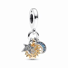 Bring a sprinkling of celestial magic to your jewelry styling with the Two-tone Celestial Triple Dangle Charm. This charm combines three celestial icons: a sun motif in 14k gold plating with sparkling stones and microbeads, a sterling silver star with clear pavé and a sterling silver crescent moon with deep blue stones. Wear it as a symbol of balance and harmony, in the cosmic dance of the universe and within ourselves. Pandora Charms Gold, Pandora Bracelet Charms Ideas, Pandora Bracelet Designs, Charms Pandora, Bracelet Pandora, Pandora Bracelet Charms, Bracelet Charms, Pandora Charm, Moon Charm