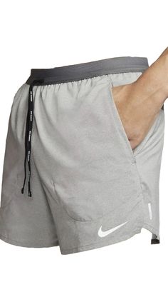 Nike Athletic Shorts With Elastic Waistband For Gym, Nike Gray Activewear With Built-in Shorts, Nike Athletic Shorts With Elastic Waistband For Jogging, Nike Activewear With Pockets For Training, Nike Go-dry Athletic Shorts For Jogging, Nike Functional Athletic Shorts For Jogging, Functional Nike Athletic Shorts For Jogging, Nike Athletic Shorts For Jogging, Nike Breathable Nylon Athletic Shorts