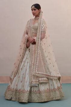 Shop for Angad Singh Ivory Floral Embroidered Raw Silk Lehenga Set for Women Online at Aza Fashions Double Dupatta Bridal Lehenga, Double Dupatta, Ivory Lehenga, Latest Bridal Lehenga Designs, Bridal Lehenga Designs, Latest Bridal Lehenga, Raw Silk Lehenga, Floral Lehenga, Zardozi Embroidery