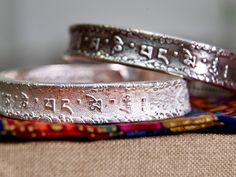 "This heavy Tibetan Mantra Cuff Bracelet is hand-crafted from the finest 999 sterling silver. Our bangle bracelet is available in two colors, Antique finish or original silvery satin finish. Both the inner and outer sides featured Tibetan mantra engraving. The outside showcases an intricate inscription of the six-word mantra \"Om mani padme hum.\" Tibetan mantra Om Mani Padme Hum , it is a powerful Tibetan buddhism mantra , it brings you positive energy , compassion thoughts , good vibes , inner Unique Cuff Bracelet For Festivals As A Gift, Unique Cuff Bracelet As Festival Gift, Unique Cuff Bracelet As Gift For Festivals, Ceremonial Sterling Silver Bangle Bracelet, Spiritual Style, Ceremonial Sterling Silver Bangle For Spiritual Occasions, Handmade Silver Spiritual Bangle, Spiritual Sterling Silver Cuff Bracelet For Ceremonial Use, Spiritual Sterling Silver Cuff Bracelet For Ceremonial Occasions, Handmade Spiritual Cuff Bracelet For Festivals