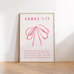 a pink poster with the words james 11 17 on it in front of a white wall