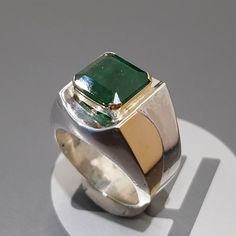 Watch video here: https://youtu.be/oy8TZ2IHB1o Natural Unheated Untreated beautiful Swat Rich green dark Emerald Rich Green Beautiful Color Stone weight : 7.30 Carats Stone shape is emerald cut Stone has natural inclusions but not broken Highest Quality Emerald Premium 925 Sterling Silver Ring size 10 US Resize able as per buyer choice Premium Quality Engagement Ring Anniversary Ring Shipping option is FedEx Three working days Handling Time Lowest Price ever for this kind of Big emerald. Contact Silver Octagon Emerald Ring, Modern Emerald-cut Green Diamond Ring, Green Octagon Diamond Ring, Formal Octagon Emerald Ring May Birthstone, Formal Octagon Emerald Ring For May Birthstone, Green Emerald Cut Gemstones For Anniversary, Green Emerald Ring With Bezel Setting, Emerald Cut Green Gemstones For Anniversary, Fine Jewelry Green Sapphire Ring With Prong Setting