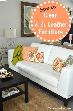 a clean white leather furniture in a living room with the words how to clean white leather furniture