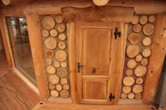 a wooden cabinet with wood slices on the front and back doors, made out of logs