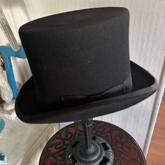 Vintage Black Wool Top Hat ~ A Black Grosgrain Ribbon Finishes In A Flat Bow On The Side Of The Brim. Inside Looks Ned In A Black Leatherette Band And Rich Red Satin. All Sides Of The Hat Shown In Photos. Inside Circumference Measures Approximately 22-1/2”. Crown Height Is 6-1/2”. Brim Measures 2”. In Excellent Preowned Vintage Condition. Smoke-Free Home. Black Velvet Top, Crown Heights, Bow Flats, Red Satin, Velvet Tops, Top Hat, Black Wool, Vintage Accessories, Grosgrain Ribbon