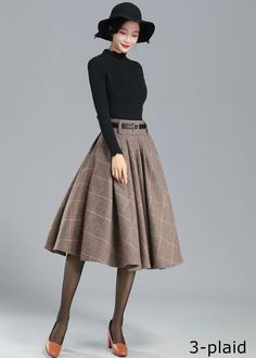 Fitted Long Pleated Skirt For Fall, Fitted Denim Skirt For Winter, Chic Winter Wool Skirt, Pleated Long Skirt For Winter, Long Pleated Skirt For Winter, Chic Wool Skirt For Winter, Winter Knee-length Lined Pleated Skirt, Chic Winter Full Skirt, Chic Wool Flared Skirt