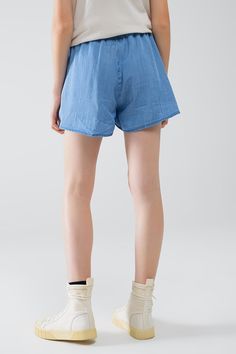 Length: Short. Subcategory: Shorts. Fit: Relaxed fit. Style: Comfy. Fabric: Lightweight woven fabric . Pockets: Side pockets . Waist: Elasticated drawstring waist. runs true to size. S. 100% Tencel High Rise Bottoms With Drawstring And Relaxed Fit, High Rise Relaxed Fit Bottoms With Drawstring, High Waist Denim Bottoms With Drawstring, Denim Blue High Rise Bottoms With Drawstring, Casual Stretch Cotton Jean Shorts, Mid-rise Denim Bottoms With Drawstring, Spring Denim Bottoms With Drawstring, High Rise Denim Blue Bottoms With Drawstring, Spring Denim Drawstring Bottoms