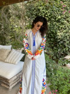 "This bohemian multicolour embroidery dress is a an eye catcher! It is an extremely comfortable wear, light and soft and can be used on many occasions - home gatherings, festival parties, summer occasions, dinners, or just in your home to feel comfortable. Fabric : 70% Egyptian Cotton; 30% Polyester. Kaftan measurements in inches : Medium (Size 8/10 USA) Bust : 39-40 Hip : 45-46 Large (Size 12/14 USA) Bust : 44-45 Hip : 50-51 XL (Size 16/18 USA) Bust : 47-48 Hip : 53-54 XXL (Size 20/22 USA) Bust Traditional Maxi Dress With Multicolor Embroidery, Traditional Multicolor Embroidered Maxi Dress, Traditional Embroidered Multicolor Maxi Dress, Spring Folk Style Kaftan With Geometric Embroidery, Spring V-neck Maxi Dress With Multicolor Embroidery, Traditional Maxi Dress With Multicolor Floral Embroidery, Traditional Floral Embroidered Maxi Dress, Traditional Long Sleeve Maxi Dress With Multicolor Embroidery, Maxi Length Dress With Multicolor Embroidery And Embroidered Border