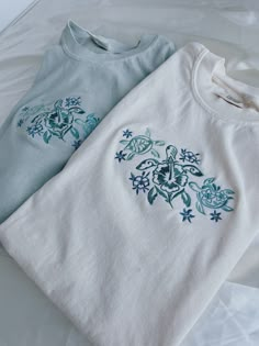 Tropical Turtles Embroidered T-Shirt! -Embroidered on 100% cotton Comfort Colors T-shirt, this design is simple and minimalistic, perfect for every outfit! -Embroidery design measures  -See product pictures for shirt sizing chart. **T-SHIRTS ARE IN UNISEX SIZING AND RUN TRUE TO SIZE. -All t-shirts are handmade on an embroidery machine so there may be slight differences, but we only sell the sweatshirts that meet our high-quality standards. -To maintain the quality of your T-shirt and the embroid Cheap Crew Neck Tops For Summer Adventures, Cute Cheap Embroidered T-shirt, Cheap Embroidered Graphics T-shirt For Spring, Affordable Embroidered Crew Neck Top For Summer, Cheap Embroidered T-shirt For Spring, Cheap Cotton Beachy Tops, Cheap Everyday Tops With Embroidered Text, Cheap Embroidered Fan Merchandise Tops, Cute Simple Shirt Designs