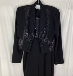 "Perceptions by Irene B- black glitter and  sequin jumpsuit and matching bolero jacket  Size-8 Tacked in removable shoulder pads  two self covered buttons on either side of the jacket   Comes with a belt with loops on the jumpsuit  Jumpsuit zips up the back- Jumpsuit- armpit to armpit--17\" has some horizontal stretch - goes to 19\" Jumpsuit inseam-31\" 100% poly Like new" Jumpsuit And Jacket, Black Sequin Jacket, Glitter Jumpsuit, Sequin Jumpsuit, Womens Jumpsuits, Syracuse Ny, Alex Evenings, Sequin Jacket, Bolero Jacket