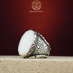 Stone Type: Mother of Pearl -Stone Dimensions: 1.8 cm x 2.5 cm -Metal Type: Sterling Silver(925k) & Bronze Details (Yellow Part) -Weight of the Item: 25 gr (Approx.) All items comes in a special gift box. If you don't see your size, please ask, we may produce your size. You are looking at the high quality handcrafted silver ring. All of our items have been designed and produced by ourselves ,so all our items comes with 1 year warranty as well. Mens Eye Glasses, Sadio Mane, Big Stone Ring, Jewelry Design Drawing, Thick Ring, Ring Elegant, Pearl Stone, Sterling Silver Mens Rings, Ring For Men