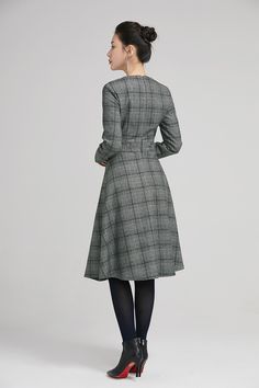 "Retro wool plaid long sleeves dress in classic hues of gray, black and white. This dress features a round neckline,fitted waist, fully lined and a back zipper closure. Details: * plaid wool fabric with fully polyester lining * long sleeves * round neckline * back zipper closure * no pockets * knee length * with buttons decoration * womens dresses, winter dress SIZE GUIDE Size vary between Brand and Country Please get your body measurement with our Size Guide And Find your size in our Size Chart Gray A-line Winter Dresses, Elegant Plaid Midi-length Dress, Formal A-line Tweed Dress For Fall, Fall Long Sleeve Wool Midi Dress, Wool Long Sleeve Midi Dress For Fall, Fall Wool Midi Dress With Long Sleeves, Wool Midi Dress With Long Sleeves For Fall, Fitted A-line Plaid Dress For Fall, Winter Midi Length Long Sleeve Workwear Dress