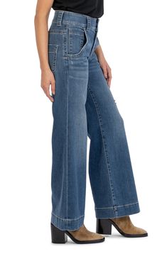 Make a casual-chic statement in these faded jeans featuring wide legs and low-stretch denim. 30 1/2" inseam; 23" leg opening; 11" front rise: 15" back rise (size 8) 85% cotton, 14% polyester, 1% spandex Machine wash, tumble dry Imported Fall Medium Wash Mid-rise Wide Leg Pants, Medium Wash Mid-rise Wide Leg Pants For Fall, Mid-rise Medium Wash Wide Leg Pants For Fall, Chic Mid-rise Faded Flare Jeans, Medium Wash Wide Leg Pants For Fall, Fall Medium Wash Wide-leg Flare Jeans, Faded Wide Leg Flare Jeans, Chic Wide Leg Faded Bottoms, Chic Faded Wide Leg Bottoms