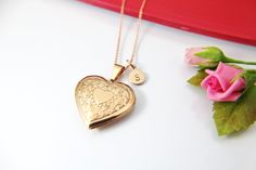 This is a rose gold-tone stainless steel locket charm with hand-stamped initial charm on Rose Gold over a stainless steel chain 18 inches. (Hypoallergenic) Tarnish Resistant! Top Quality, Happiness Guarantee! ♥ You will receive 1 necklace ♥ 304 Stainless Steel Locket Pendants, Photo Frame Charms, Heart, Rose Gold, 29x29x6.5mm, inner diameter: 20x21mm ♥ Initial Disc Stainless Steel Charms, Flat Round, 8-10mm. ♥ Stainless Steel cian 18 inches **conversion : 1 inch = 25.4mm or 1mm = 0.0393 inch** ♥ Personalized Brass Pendant Locket Necklace, Personalized Yellow Gold Brass Locket Necklace, Personalized Brass Locket Necklace For Gift, Personalized Brass Medallion Locket Necklace, Personalized Gold Heart Pendant Locket Necklace, Personalized Gold Heart Locket Necklace, Gold Heart Locket Necklace For Personalized Gift, Gold Heart Locket Necklace As A Personalized Gift, Personalized Gold Brass Locket Necklace