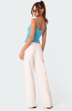 A low rise and relaxed fit lend trend-savvy appeal to nonstretch-denim jeans finished with frayed hems for lived-in appeal. 100% cotton Machine wash, dry flat Imported Trendy Summer Cotton Jeans, Relaxed Fit Cotton Cutoff Flare Jeans, Relaxed Fit Cotton Flare Jeans With Cutoff, Trendy Cotton Cutoff Cropped Jeans, Casual Cotton Cutoff Pants, Trendy Cotton Cutoff Flare Jeans, Trendy Cutoff Cotton Flare Jeans, Trendy Cutoff Flare Cotton Jeans, High Rise Denim Blue Cropped Jeans