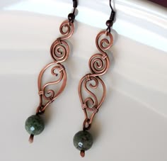 Antiqued raw copper wire earrings with Indian Agate gemstones. I made them with bare copper wire, oxidized and polished. Elegant rustic style earrings, perfect gift for mother, sister, daughter, best friend.   Unique piece  oooo Your purchase will be shipped within 1-3 business days from receiving the payment.  I ship everywhere with Hellenic Post Office, using registered mail A' priority. oooo Instagram @ianirasartifacts Copper Wire Earrings, Dangle Beaded Earrings, Beaded Boho Jewelry, Wire Jewelry Earrings, Braided Bracelet Diy, Wire Wrap Jewelry Designs, Hammered Jewelry, Indian Agate, Boho Style Jewelry