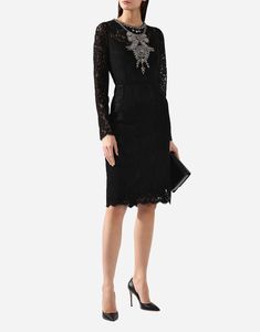 Our black cotton blend Crystal Embellished Lace Dress from Dolce & Gabbana features sheer panels and scalloped details, showcasing their expertise in mixing heritage tulle for a romantic, feminine look. With round neck long sleeves, this mid-length is the perfect addition to any elegant occasion. Elegant Cocktail Dress With Lace Trim, Elegant Gala Lace Dress With Sheer Sleeves, Elegant Dresses With Lace Sleeves, Luxury Formal Dress With Lace Trim, Luxury Scalloped Lace Formal Dress, Luxury Scalloped Lace Dresses For Formal Occasions, Luxury Lace Trim Dress For Gala, Luxury Lace Dress With Lace Trim For Formal Occasions, Luxury Formal Dresses With Lace Sleeves