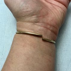 "Quantity: 1 Unit Dimensions: Length (Exterior) - 2.2\" (57mm) Length (Interior) - 2.1\" (53mm) Width - 0.8\" (20mm)" Timeless Gold Metal Cuff Bracelet, Classic Gold-tone Metal Cuff Bracelet, Timeless Gold Cuff Bracelet With Polished Finish, Timeless Adjustable Double Band Jewelry, Elegant Bronze Bangle Bracelet, Elegant Bronze Bangle, Elegant Bronze Bangle Jewelry, Formal Double Band Bracelet With Strap, Elegant Brass Bracelet With Polished Finish