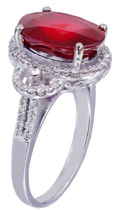 14K WHITE GOLD, 6.50CTW OVAL RUBY WITH ROUND CUT DIAMONDS, ART-DECO PRONG SET STYLE RING A STUNNING DESIGN, WITH A BEAUTIFUL OVAL SHAPED FACETED CUT RUBY (filled) WITH SUPERB LUSTER COLOR AND LIFE. THIS BEAUTIFUL & HUGE (JUST LOOK AT THE PICS) 6.00CT OVAL CUT RUBY IS SET ON A HIGHLY DETAILED FILIGREESETTINGA BEAUTIFUL RUBY WITH AN AMAZING COLORTotal weight is 6.50ct. TO WATCH A LIVE VIDEO OF THIS STUNNING RING PLEASE GO TO THE YOUTUBE LINK BELOW:https://youtu.be/veOd7XlYXdQTotal weight is 6.50ct Wedding Ruby Ring In White Gold With Diamond Accents, Exquisite Pear-shaped Diamond Ring With Halo Setting, Dazzling Ruby Ring With Diamond Accents For Wedding, Exquisite Oval Halo Ring For Formal Occasions, Anniversary Ruby Ring With Marquise Cut And Halo Setting, Oval Ruby Ring With Vvs Clarity Diamond, Classic White Oval Ruby Ring, Dazzling Oval Ruby Wedding Ring, White Ruby Ring With Halo Setting For Wedding