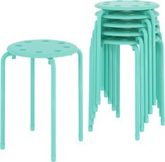 six stools and one table with holes on the top, all in aqua blue