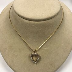 "Vintage 14K Yellow Gold 1CT (16) Diamond Heart Pendant 18\" Chain Necklace PLEASE READ ENTIRE DESCRIPTION BEFORE PURCHASING Please see pictures for more details! Item is great condition for it's age. Minor signs of wear Specifics: * 14K Yellow Gold Heart Pendant with 16 small diamonds (.06CT each, total approx. 1CT) and 14K Yellow Gold Chain 18\" long (both tested, pendant stamped) * Pendant measures approx. 19mm(not including a bail) x 16mm If you have any questions regarding this item or pric Valentine's Day Yellow Gold Box Chain Necklace, Yellow Gold Heart-shaped Necklace With Box Chain, Yellow Gold Heart Necklace With Box Chain, Heart-shaped Yellow Gold Necklace With Box Chain, Classic Heart Pendant Necklace With 17 Jewels, Classic Gold Diamond Necklace With Heart Charm, Yellow Gold Heart Pendant Necklace With Box Chain, Classic Gold Heart Cut Diamond Necklace, Gold Heart Cut Diamond Necklace For Formal Occasions