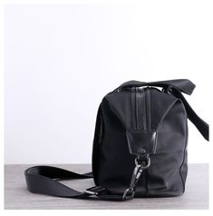 Overview： Design: Nylon Crossbody Bag Black Leather Handbag Nylon Shoulder Bag Crossbody Nylon BagIn Stock: Ready to Ship (2-4 days)Include: Only BagCustom: NoColor: BlackLeather: Nylon, LeatherMeasures: 36 cm x 27cm x 16cm Weight: 0.65kgSlots: 2 main slots, 2 zipper slot, 1 phone pocket, 1 wallet pocket, 2 side slotsAccessories(option): NoneStyle: Nylon Crossbody Bag Black Leather Handbag Nylon Shoulder Bag Crossbody Nylon BagVery durable (At least 5 Years) and it should last a life time Note： Nylon Travel Shoulder Bag With Adjustable Strap, Nylon Shoulder Travel Bag With Adjustable Strap, Nylon Travel Bag With Adjustable Strap, Nylon Satchel Travel Bag With Adjustable Strap, Black Nylon Duffle Bag With Removable Pouch, Black Nylon Bag With Zipper Pocket, Black Nylon Bags With Zipper Closure, Nylon Duffle Bag Satchel With Adjustable Strap, Nylon Duffle Bag With Adjustable Strap