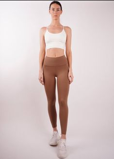 After tested hundreds of materials and silhouette, we finally made this legging! Comfortable in the buttery soft and stretchy fabric, with a light/medium support. Whether it's leg day at the gym or heading to a yoga and barre class, these will be your go-to leggings🍑 Light brown tan color Buttery soft material to provide a second skin feeling when wearing Double layer and seamless waistband to prevent digging Stretchy and body-shaping Ankle-Length Designed for all types of workout Fabric 81% Ny Compressive Athleisure Tights With Light Support, Casual Seamless Leggings With 4-way Stretch, Soft Touch Yoga Bottoms, Versatile Soft-touch Activewear For Yoga, Tight Sportswear Leggings For Light Exercise, Versatile Compression Tights With Light Support, Seamless Elastane Leggings For Pilates, Micro-elastic Go-dry Yoga Pants For Light Exercise, Compressive Moisture-wicking Yoga Tights