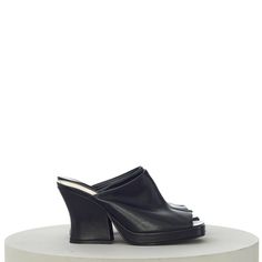 BOTTEGA VENETA WOMEN'S WEDGE MULE SANDALS IN BLACK LEATHER Retailprice: 1250$ Description Leather upper with kid suede sole Round toe Sculptural chunky heel Approx 110mm/ 4.25 inch heel Approx 40mm/ 1.5 inch platform Made in Italy Details Please choose from available sizes Black Leather New in box 100% Authentic — SHIPPING & HANDLING All purchases made are shipped with FEDEX Express International Priority. In order to satisfy our customers, we charge no extra costs at all for this service. Full track & trace is available for your purchase on Fedex's website. Tracking information will be mailed to the paypal email address used with your payment. If you do not receive this email, please check your spambox. The tracking number will also be added to your purchase on eBay. Please do note that w Wedge Mules, Sandals Flats, Fedex Express, Mule Sandals, Womens Wedges, Chunky Heel, Chunky Heels, Black Sandals, Bottega Veneta