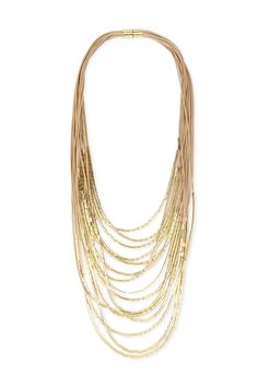 Striking strands of cord and gold combine in our Multi Strand Long Layered Necklace for an effortless statement look. Finished with a magnetic closure, this gorgeous necklace has the added bonus of being effortless to fasten! Material: Leather Cord with Gold Embellishments Size: 40" Long Closure: Magnetic Clasp Imported Unique Pearl Necklace, Pearl Cuff Bracelet, Pearl Cuff, Gold Embellishment, Long Layers, Layered Necklace, Fabric Jewelry, Magnetic Clasp, Watch Necklace