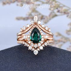 Art Deco Emerald Engagement Ring Set 3pcs Rose Gold Lab Emerald Bridal Set Woman Vintage Pearl Infinity Twist Ring Halo Ring May Birthstone Items Description: * Handmade, high-quality item! * Material: SOLID 14K/18K GOLD (can be made in white/rose/yellow gold) Engagement Ring: * Center stone: Lab emerald, Pear Shaped    6*9mm, about 1.7ct * Accents: Natural Diamonds, VS clarity, G color, 0.35ct Total    Or Colorless Moissanites, DE color, VVS clarity    Natural Fresh Water Pearl * Band width approx 2.2mm Wedding Band 1: * Moissanite, DE color, VVS clarity   Or Natural Diamond, VG color, VS clarity * Weight approx. 0.2CT Total * Band width approx 1.4mm Wedding Band 2: * Stone: Round Cut Moissanite or Diamond * Moissanite, DE color, VVS clarity Or Natural Diamond, VG color, VS clarity * Weig Silver And Emerald Engagement Ring, Emerald Ring Vintage Gold, Pearl And Emerald Ring, Emerald Green Engagement Ring, Gold Emerald Engagement Ring, Emerald Engagement Ring Green, Vintage Emerald Engagement Ring, Emerald Engagement Ring Set, Art Deco Emerald