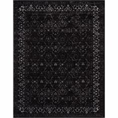 a black and white rug with an intricate design