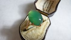 Vintage ring featuring an oval chrysoprase set in 9ct yellow gold, once foiled/gilded to the back, but this is now rubbing away a little.  The ring is certainly antique in style, however without date marks it is very difficult to be certain, but I suspect this is a mid century vintage ring, although it is worth noting that Ward Brothers are an antique maker whose origins date back to the end of the Victorian era, so it may be antique. The chrysoprase is a good sized oval cabochon stone - nice gr Minimal Surface, Mid Century Jewelry, Cabochon Ring, Mid Century Vintage, Vintage Ring, Green Stone, Oval Cabochon, Antique Items, Victorian Era