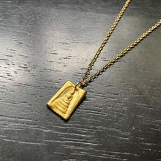 I created this pendant from a mold of a Thai Buddha Amulet! These pendants are made with GOLD VERMEIL! GOLD VERMEIL is a premier version of a thick electro-plating of 23.5 karat Gold over a solid Sterling Silver base- it's the right solution for us to provide everyone who wants their 永 pieces in GOLD that are durable, beautiful, and affordable! Still, we recommend that you wear these pieces gently and thoughtfully. The Vermeil is a surface finish after all, and although these pieces are quite st Symbolic Electroformed Gold Jewelry, Symbolic Gold Jewelry With Large Pendant, Symbolic Gold Square Pendant Jewelry, Symbolic Gold Jewelry With Square Pendant, Gold Symbolic Square Pendant Jewelry, Gold Plated Rectangular Pendant Jewelry, Hammered Yellow Gold Amulet Necklace, Symbolic Gold Hammered Necklace, Yellow Gold Hammered Amulet Necklace