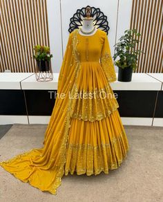 🧵Fabric Detail 🧵 💃Top💃 Top Fabrics         : Faux Georgette With Heavy 5mm Embroidery Sequence Work With  Sleeves   Top Flair         :   2.5 Meter  Top Inner        : Heavy Micro Cotton  Top Length     : 35 Inch Top Size.         :S (36) M(38) L(40) XL (42)* 💃 Lehenga💃 Lehenga Fabric :Faux Georgette With Heavy 5mm Embroidery Sequence Work  (Fully stitched) Lehenga Inner       :Heavy Micro Cotton  Lehenga Flair     : 4 Meter 💃Dupatta 💃 Dupatta Fabrics : Faux Georgette With Embroidery Sequence Work and Embroidery Sequence lace Border Dupatta Length: 2.10 mtr ⚖ Weight  : 950 gm Yellow Colour Outfits, Fitted Party Wear Sets With Resham Embroidery, Fitted Georgette Sets With Dabka Work, Fitted Georgette Sets With Zari Work, Semi-stitched Gold Georgette Sets, Yellow Floor-length Sets With Dabka Work, Party Sharara With Handwork, Floor-length Chinon Set For Wedding, Fitted Embroidered Party Wear Sets