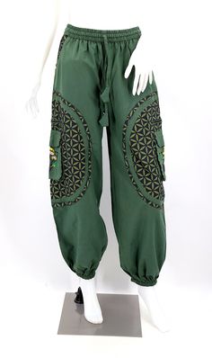 Baggy Embroidered Cotton Bottoms, Traditional Style Baggy Pants For Spring, Traditional Baggy Pants For Spring, Bohemian Cargo Pants For Festivals, Bohemian Cargo Pants With Pockets For Festival, Hippie Festival Pants With Pockets, Traditional Cotton Pants For Festivals, Traditional Cotton Bottoms With Floral Embroidery, Traditional Embroidered Cotton Bottoms