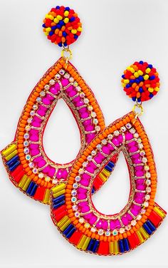 Add a fun vibe to your outfit with these colorful serape beaded earrings! Featuring shades of hot pink, orange, red, blue, and yellow, these gorgeous earrings are so super cute paired with a solid top or tee for a fun spring and summertime look! Approx 3” long, 2” wide FREE SHIPPING over $30! Vibrant Rainbow Jewelry With Colorful Design, Multicolor Fun Earrings For Vacation, Multicolor Beaded Earrings For Summer Party, Fun Multicolor Earrings For Vacation, Colorful Beaded Jewelry For Summer, Colorful Summer Jewelry With Dangling Beads, Summer Party Multicolor Beaded Earrings, Vibrant Pink Earrings For The Beach, Vibrant Beach Earrings