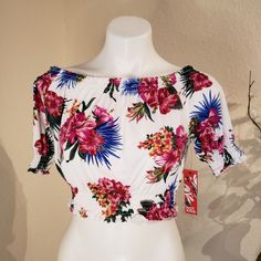 Cute Crop Top With Bright Colors Lots Of Stretch Elastc Around Arms And Midriff Summer Floral Print Crop Top With Short Sleeves, Summer Floral Print Short Sleeve Crop Top, Multicolor Short Sleeve Summer Tops, White Floral Print Cropped Crop Top, Trendy Summer Top With Tropical Print, Floral Print Short Sleeve Crop Top For Summer, Summer Multicolor Short Sleeve Tops, White Floral Print Crop Top, Floral Print Short Sleeve Crop Top For Day Out