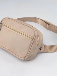 Front zip pocket, inside zip pocket, built in card wallet, adjustable strap Casual Phone Bag With Zipper Pocket For On-the-go, Casual On-the-go Pouch With Zipper Pocket, On-the-go Bag With Zipper Pocket And Pouch Shape, On-the-go Shoulder Bag With Zipper Pocket, Trendy Beige Phone Bag With Zipper Closure, Rectangular Belt Bag With Zipper Pocket For On-the-go, Casual Phone Bag With Zipper Pocket For Travel, Casual Pouch Belt Bag With Zipper Pocket, Casual Pouch Belt Bag With Zipper