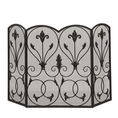 an iron fireplace screen with decorative designs on the top and bottom, shown in black